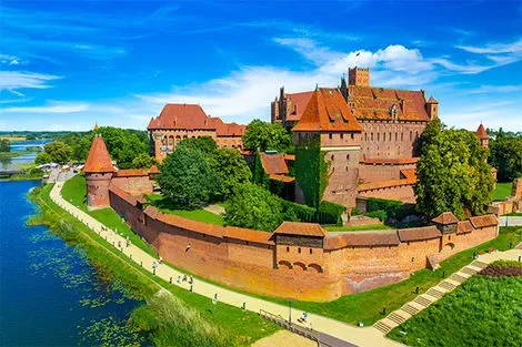 The Castle of theTeutonic Order in Malbork by the Nogat river. Poland
